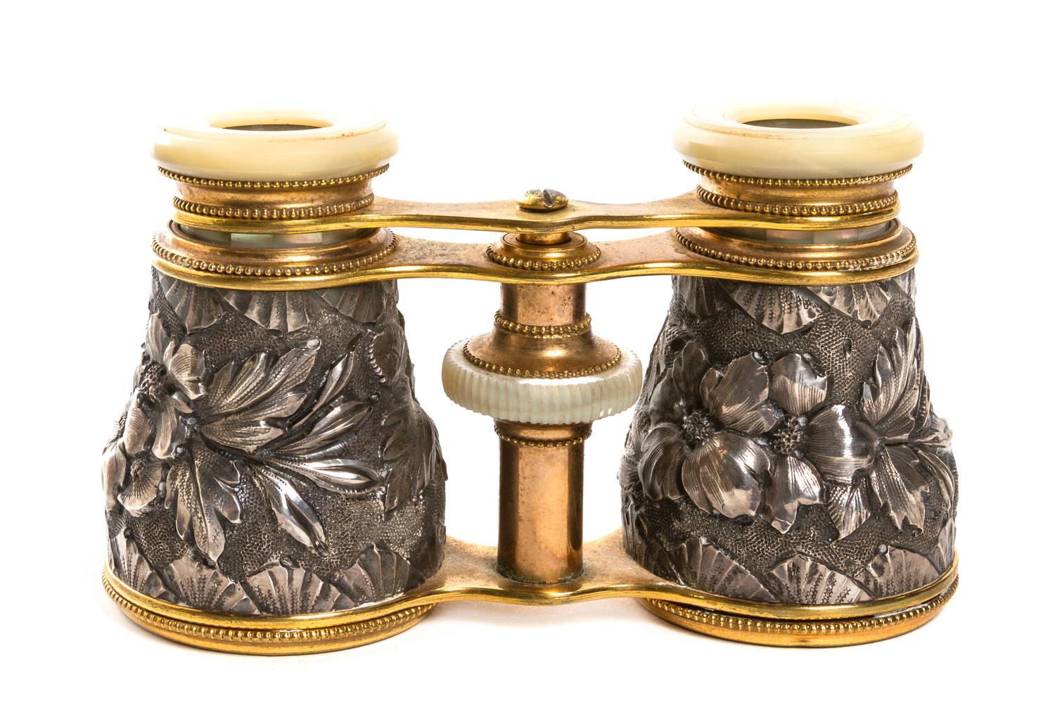 A Pair of French Silvered and Mother-of-Pearl Veneered Opera Glasses, Width 4 1/8 inches.
