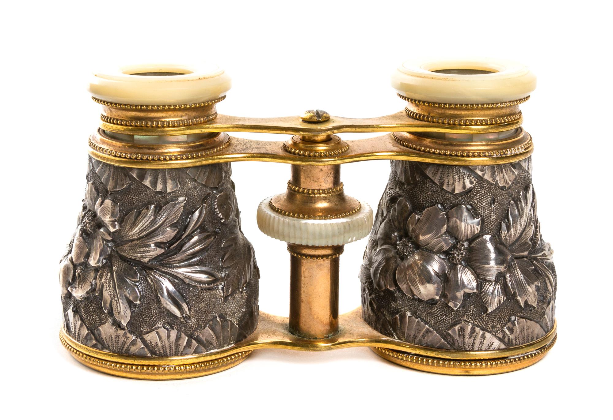 A Pair of French Silvered and Mother-of-Pearl Veneered Opera Glasses, Width 4 1/8 inches.
