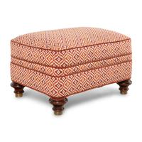 An Upholstered Mahogany Ottoman
