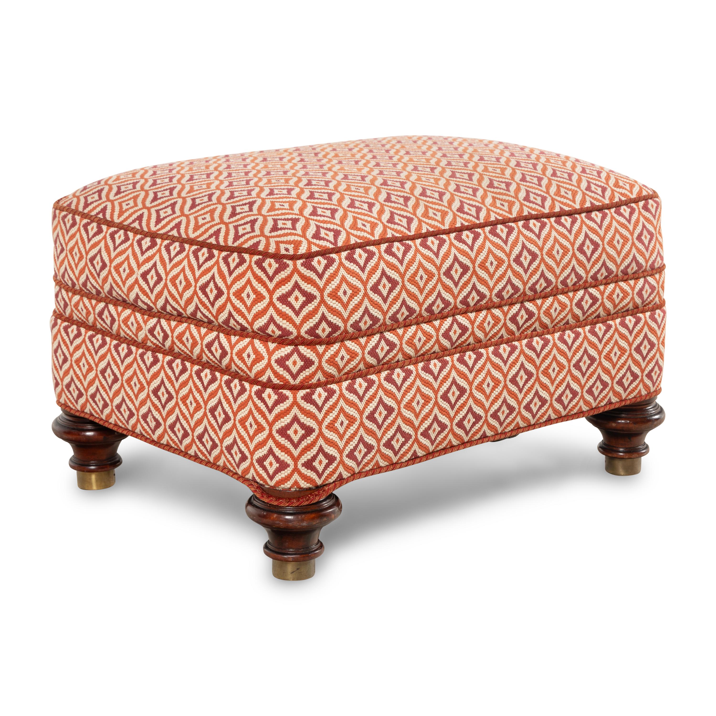 An Upholstered Mahogany Ottoman