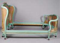 A Louis XVI Style Painted and Parcel Gilt Bed, Height of headboard 56 inches.