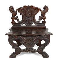 A Jacobean Style Carved Oak Bench with Armorial and Lion Carved Back