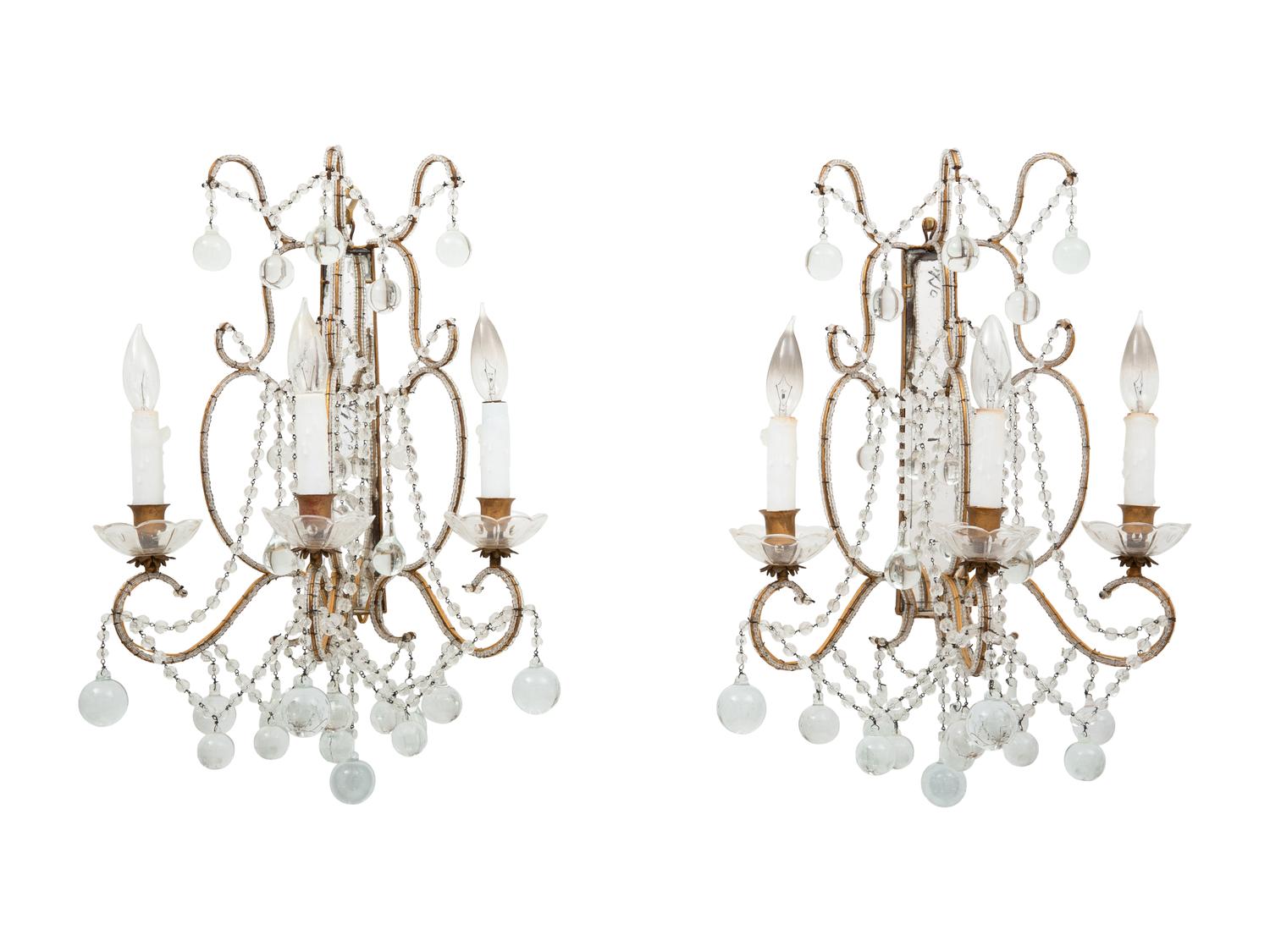 A Pair of Neoclassical Style Cut Glass and Mirrored Three-Light Sconces