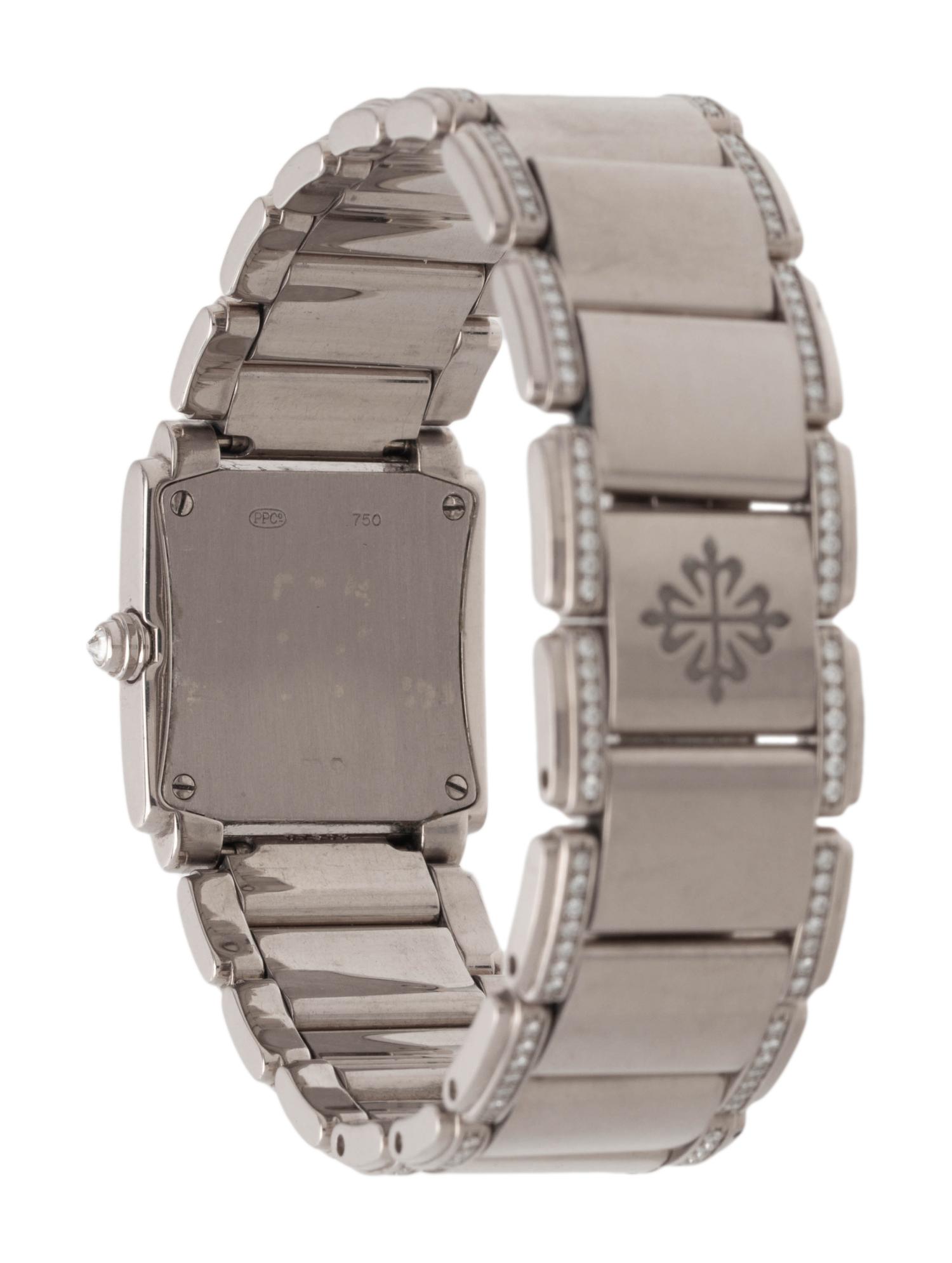 PATEK PHILIPPE, 18K WHITE GOLD REF. 4908/31 AND DIAMOND 'TWENTY-FOUR' WRISTWATCH