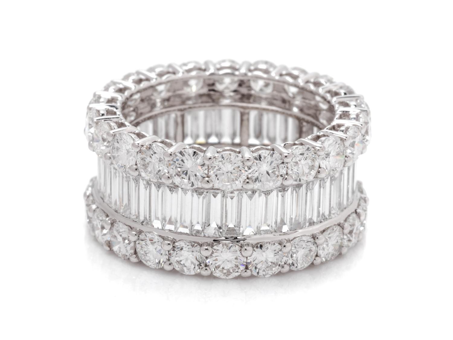 An 18 Karat White Gold and Diamond Eternity Band,