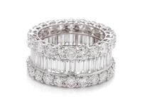 An 18 Karat White Gold and Diamond Eternity Band,