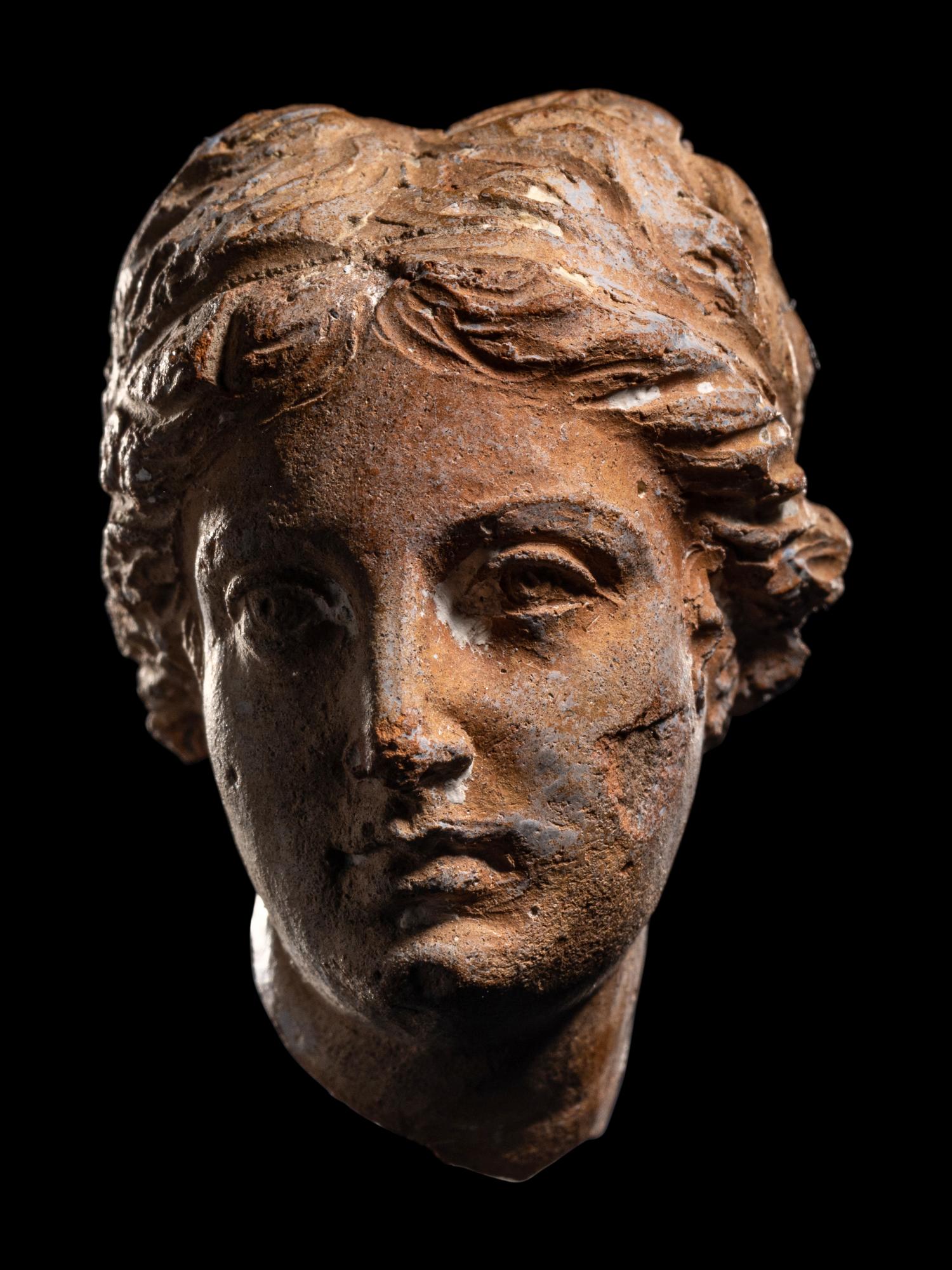 A Greek Terracotta Female Head