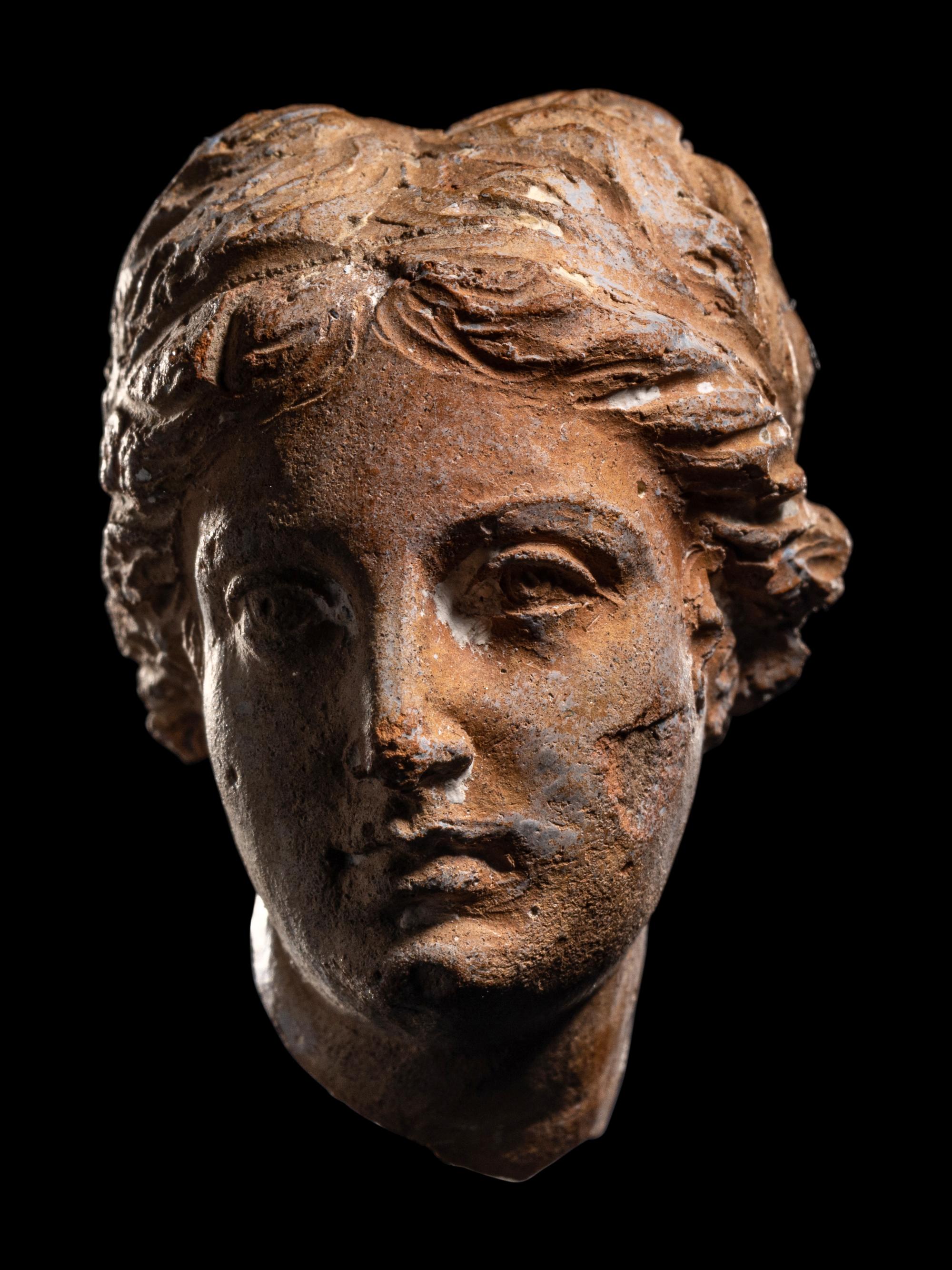 A Greek Terracotta Female Head