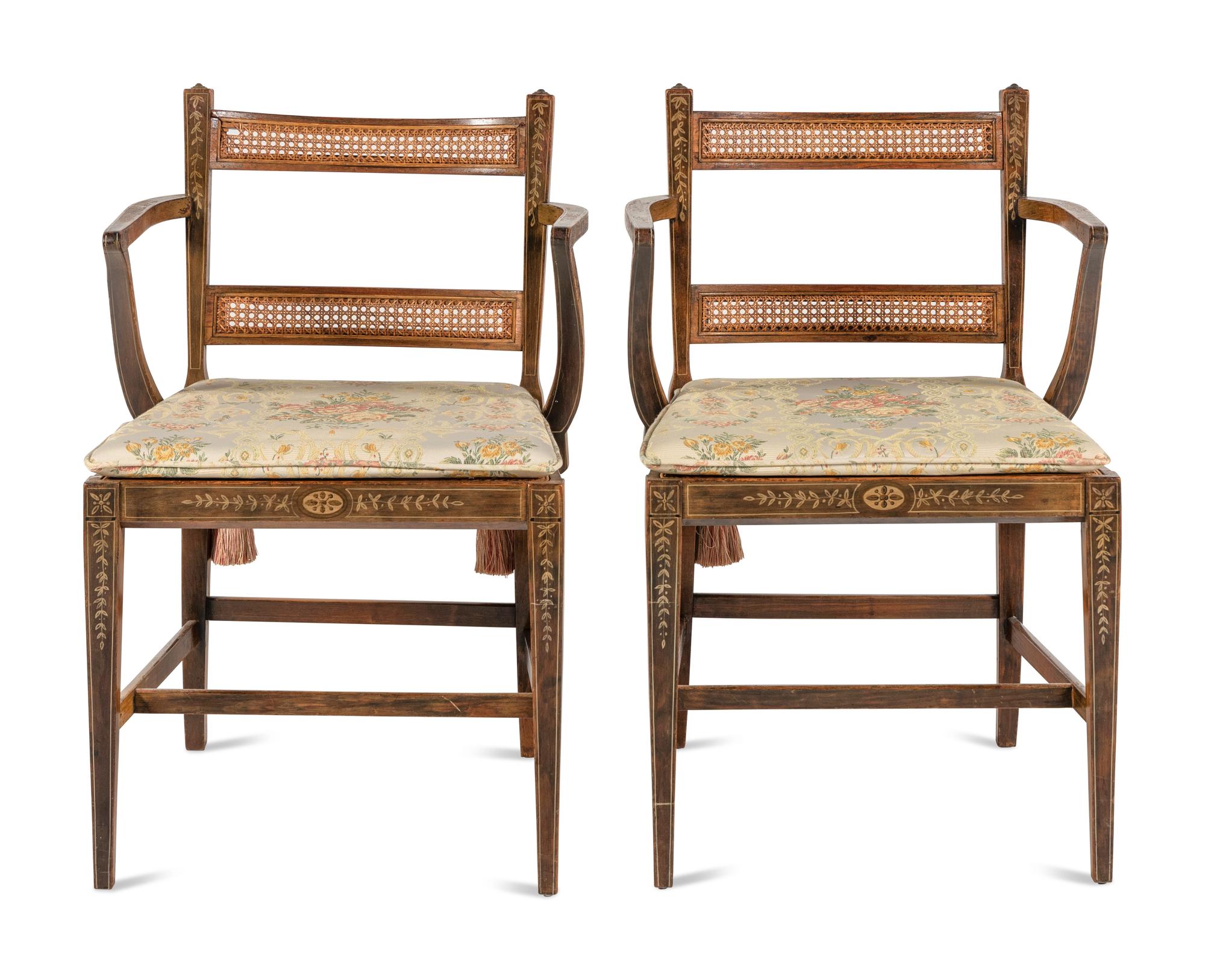 A Pair of Edwardian Painted and Caned Armchairs