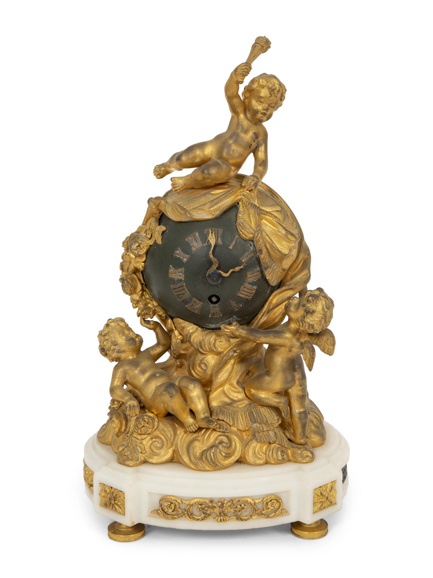 A French Gilt and Patinated Bronze Figural Clock