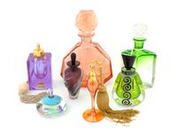 A Collection of Seven Glass Scent Bottles — 20TH CENTURY