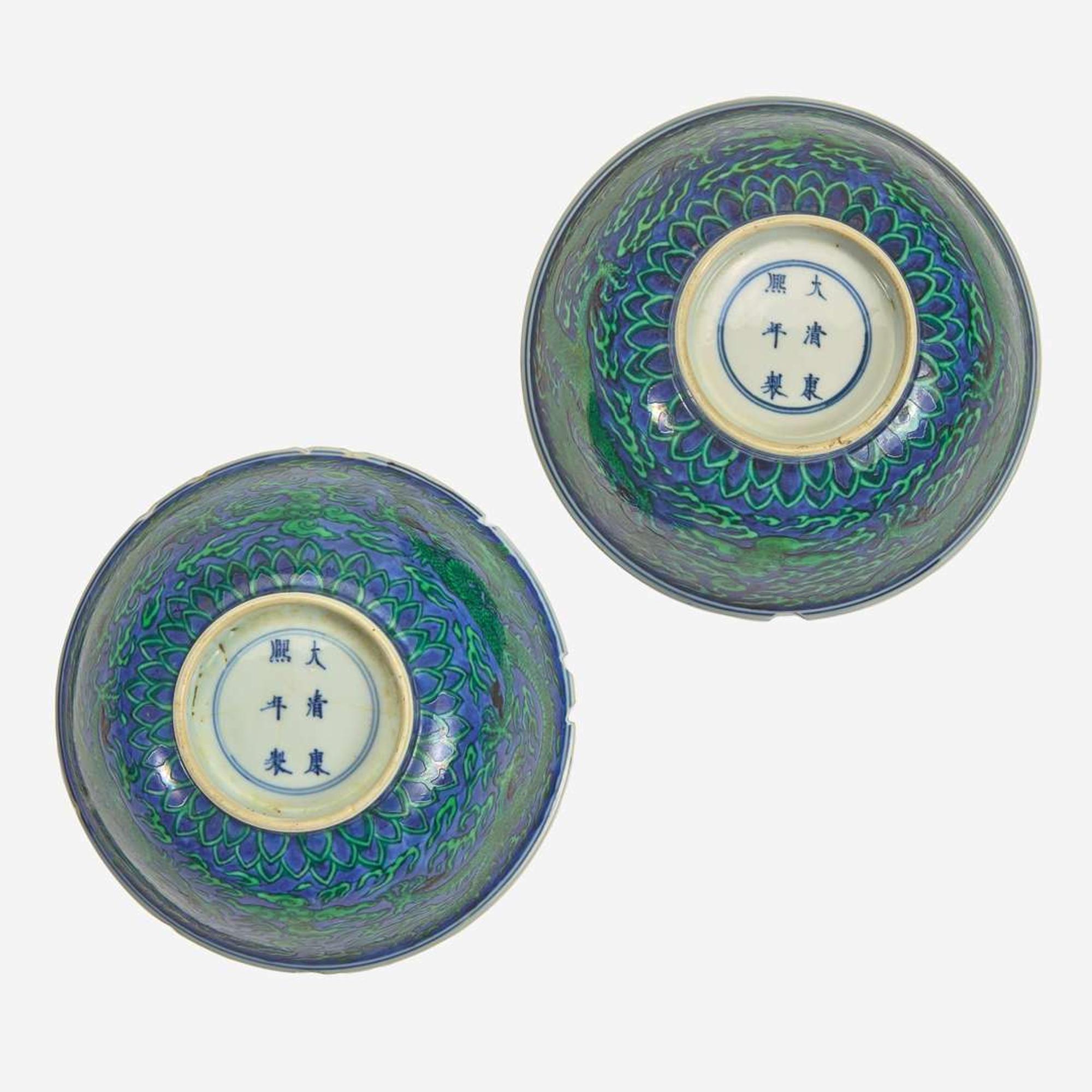 An associated pair of Chinese underglaze blue and green-enameled dragon bowls 珐琅彩青花龙纹碗一对 Kangxi six-character mark and of the period ????? ? ??