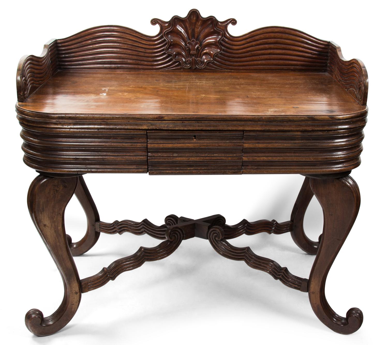 A British Colonial William IV Style Mahogany Writing Desk Height 41 1/2 x width 43 1/2 x depth 26 inches. — 19TH CENTURY