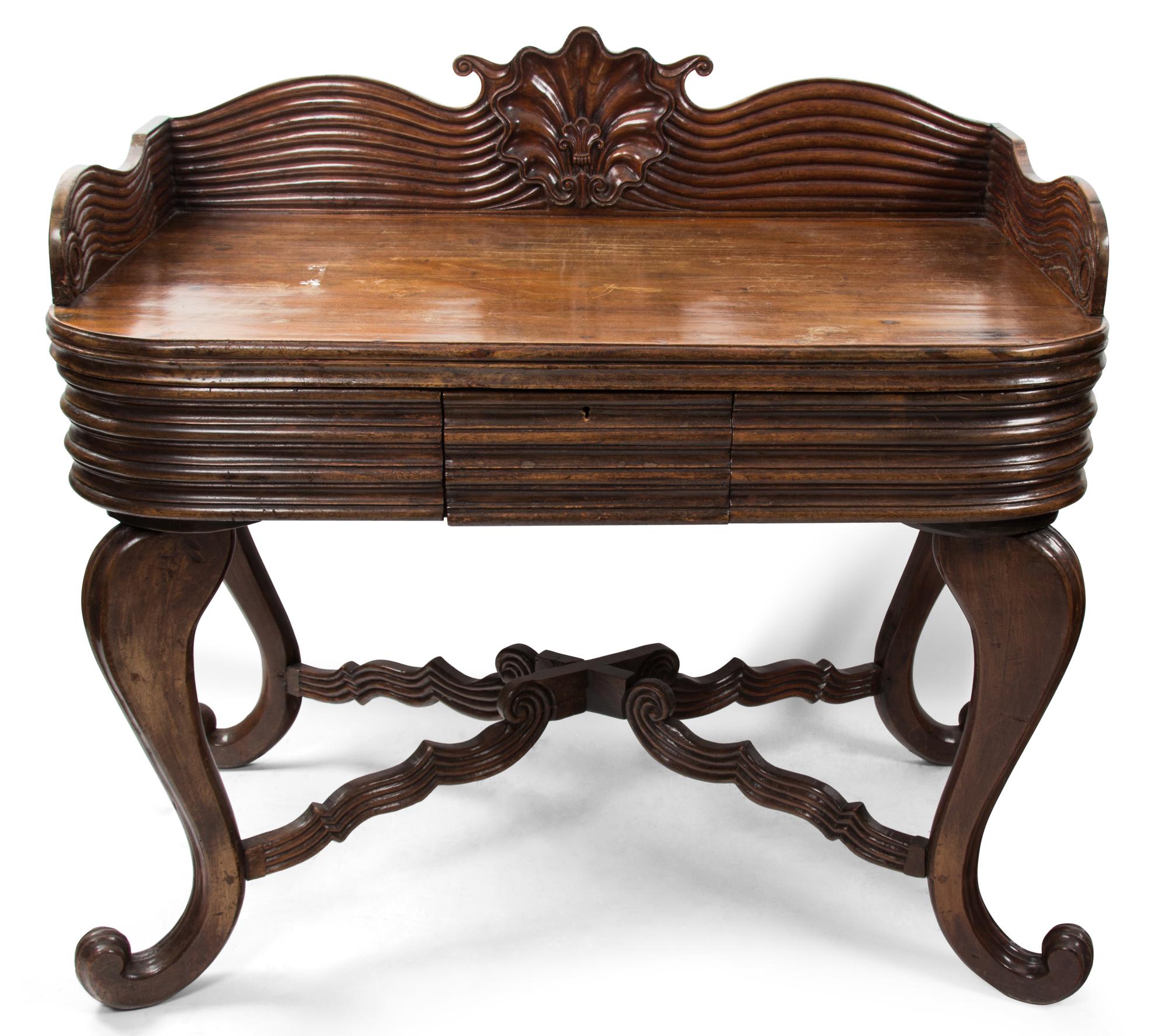 A British Colonial William IV Style Mahogany Writing Desk Height 41 1/2 x width 43 1/2 x depth 26 inches. — 19TH CENTURY