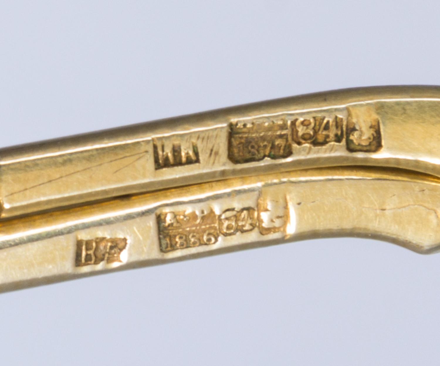 Two Russian Silver-Gilt Spoons, Various makers, Moscow, late 19th century, the underside of one bowl with niello geometric decoration,