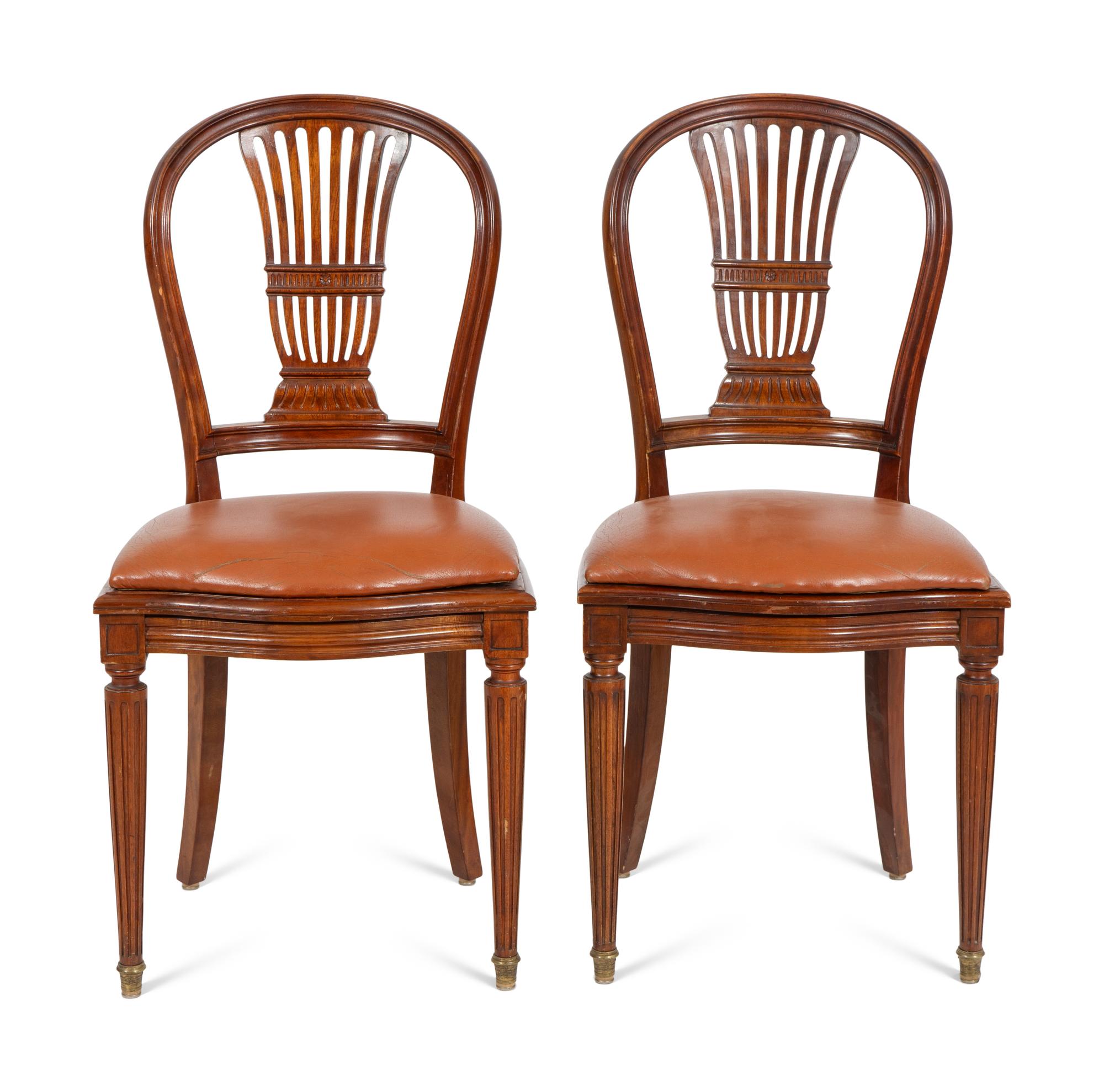 A Set of Eight Louis XVI Style Beechwood Dining Chairs