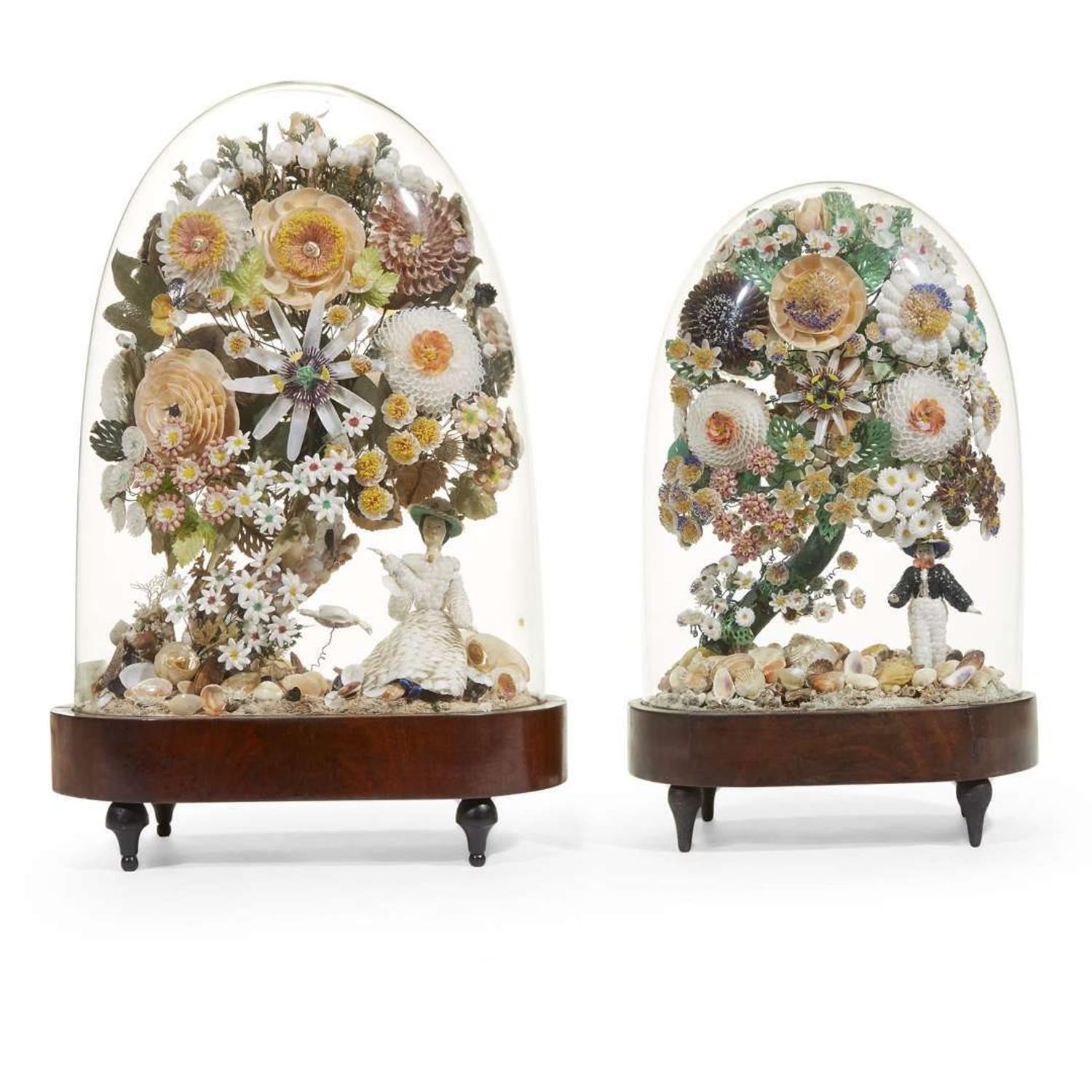 Two Victorian shellwork centerpieces under glass cloches mid-19th century