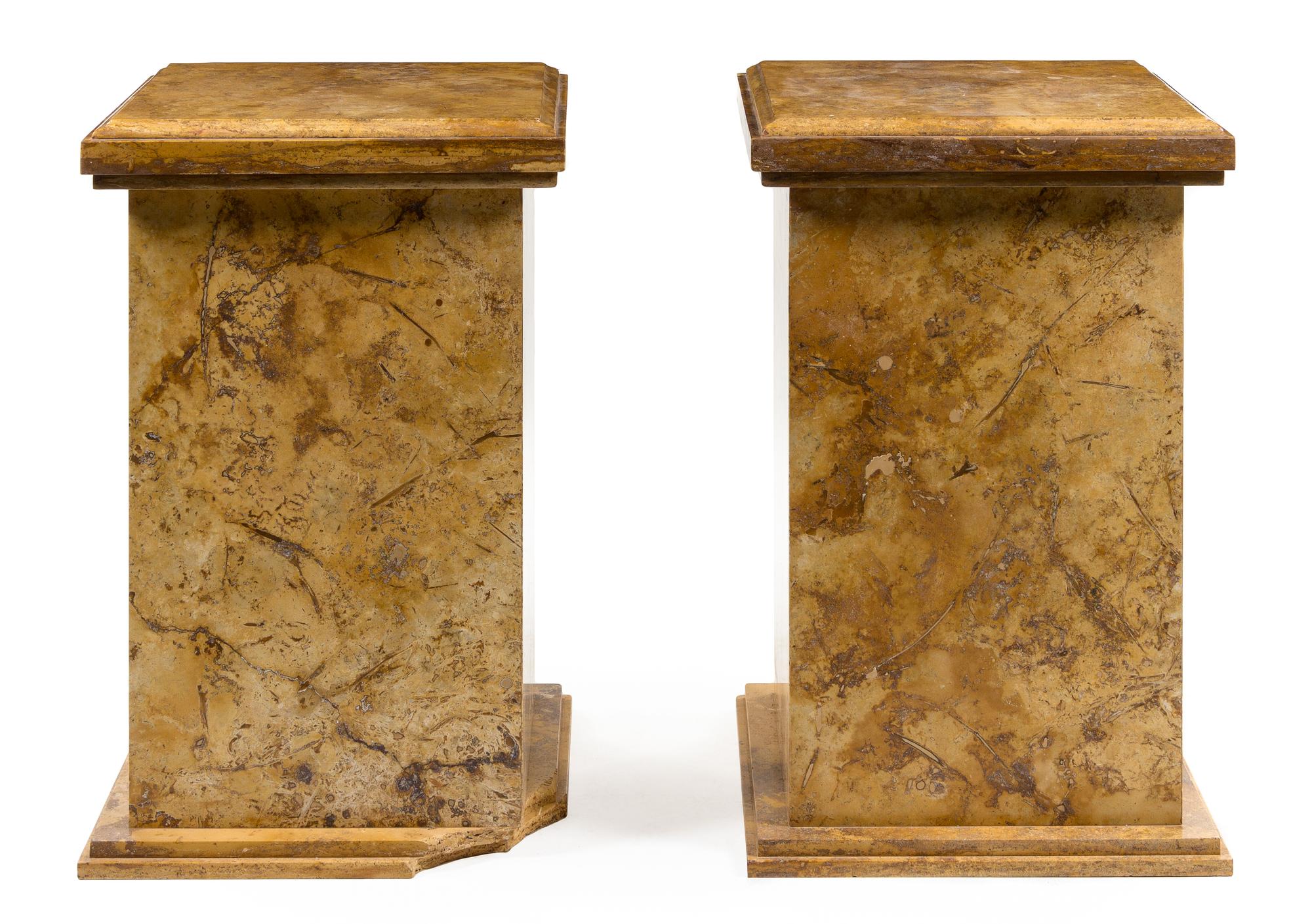 A Pair of Continental Marble Pedestals Height 33 x width 21 3/4 x depth 21 3/4 inches.