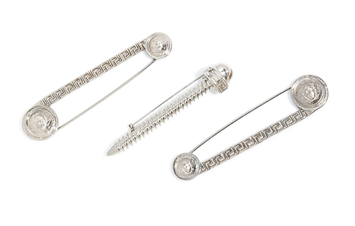 A Collection of Gianni Versace Safety Pin and Screw Brooches,