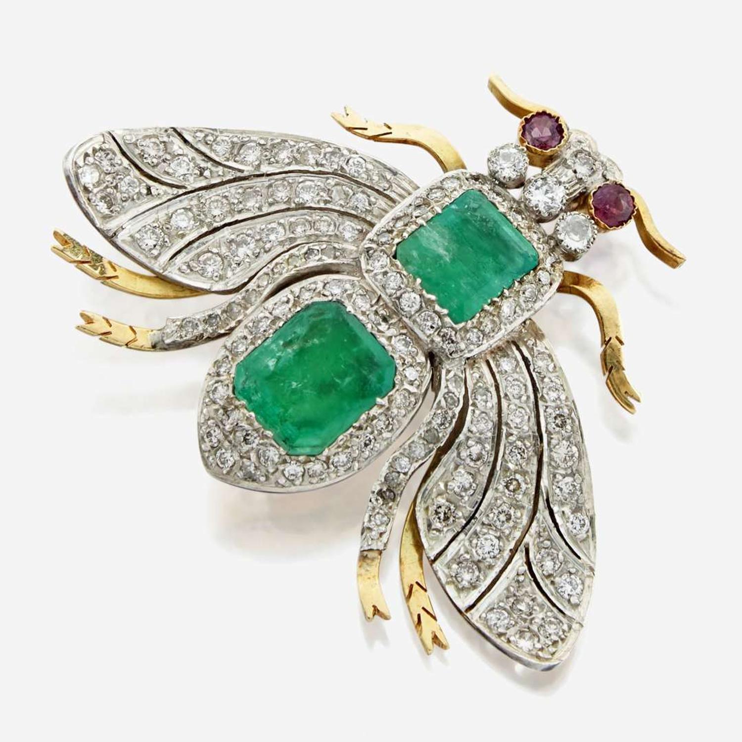 An emerald, diamond, and ruby bicolor gold brooch