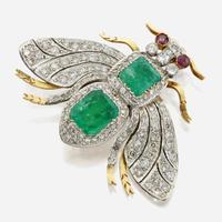 An emerald, diamond, and ruby bicolor gold brooch