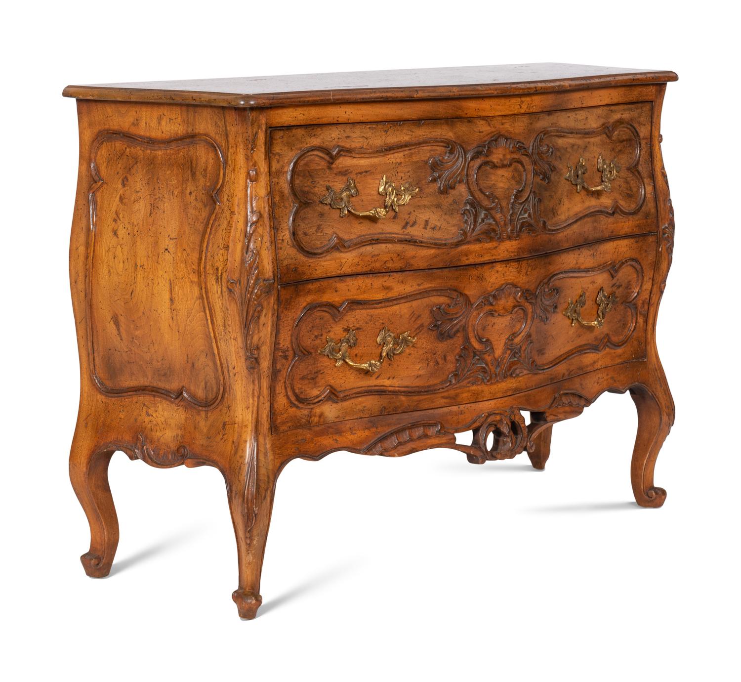 A Pair of Louis XV Style Walnut Bombé Form Commodes