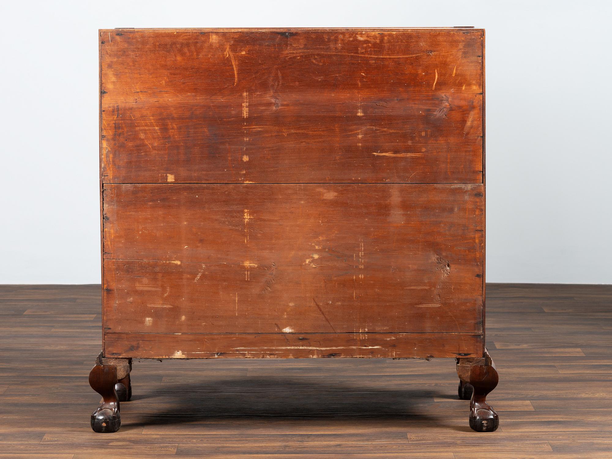 A Chippendale Carved Mahogany Reverse Serpentine Block-Front Desk