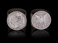 A Group of Twenty-Three United States 1887-O Morgan Silver Dollar Coins