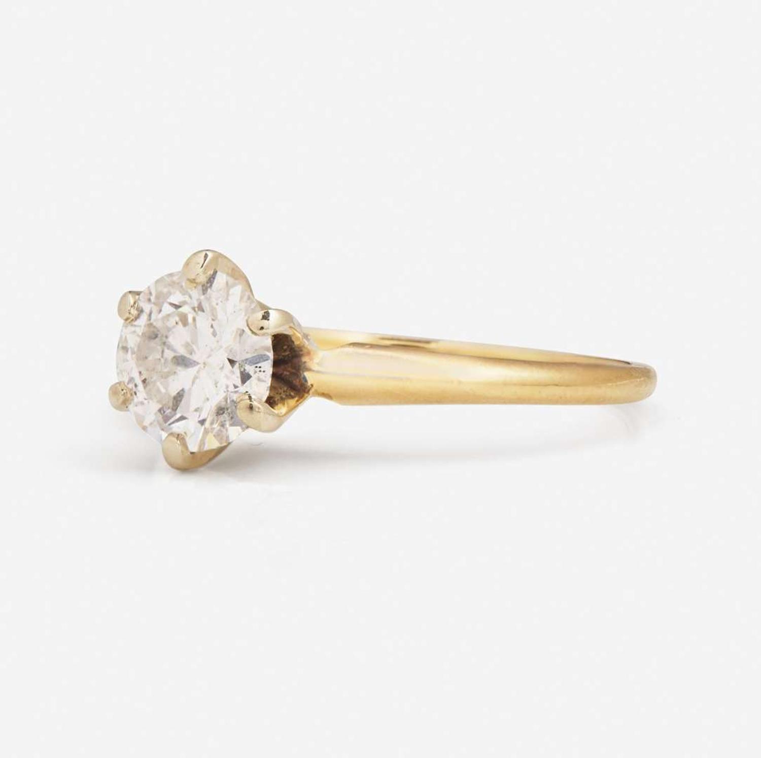 A 14K Yellow Gold Solitaire Diamond Ring