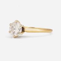 A 14K Yellow Gold Solitaire Diamond Ring