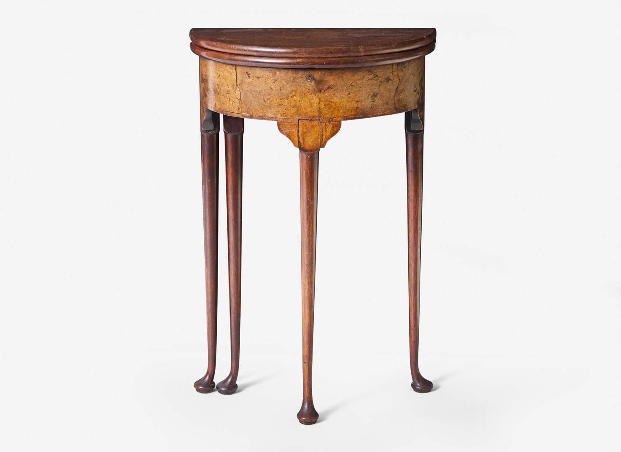 A diminutive Queen Anne burl walnut demilune games table, probably 19th century