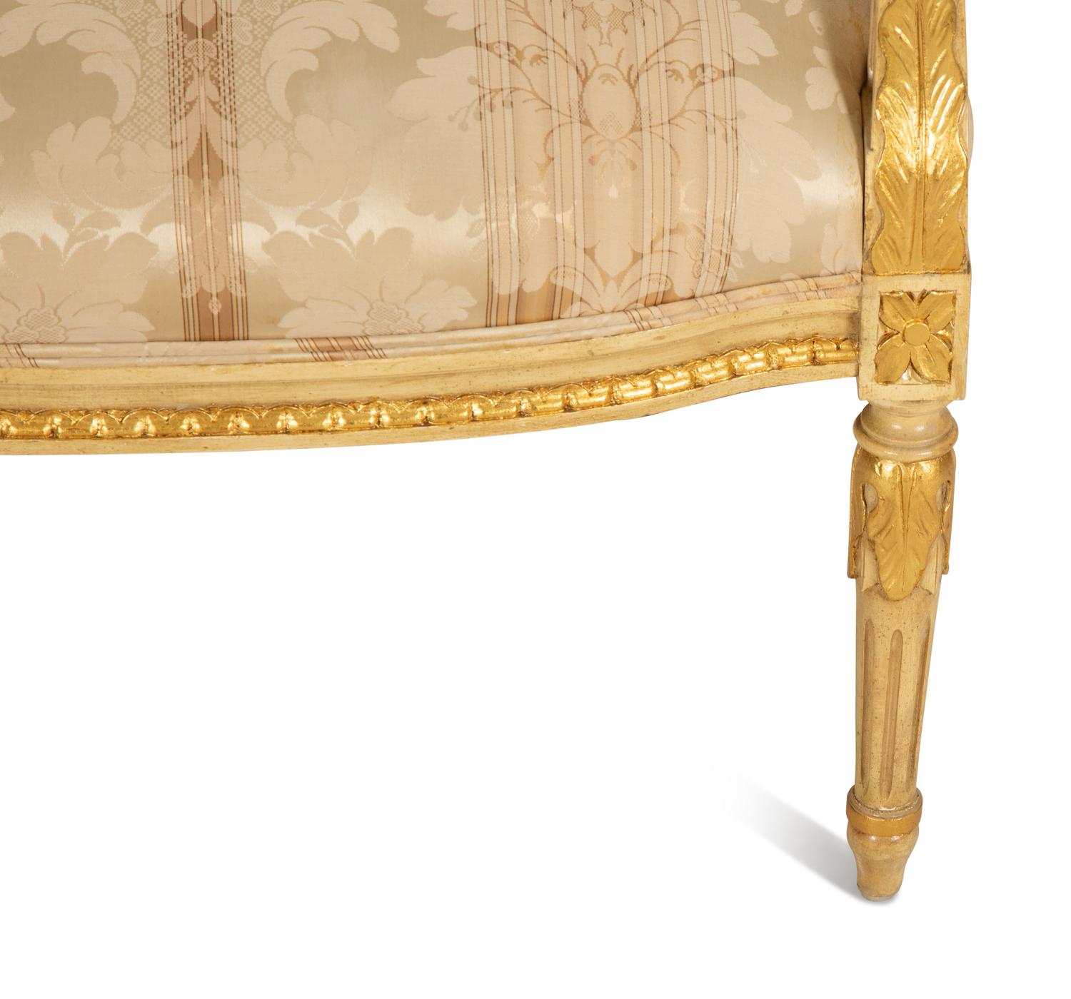 A Louis XVI Style Giltwood Fauteuil
