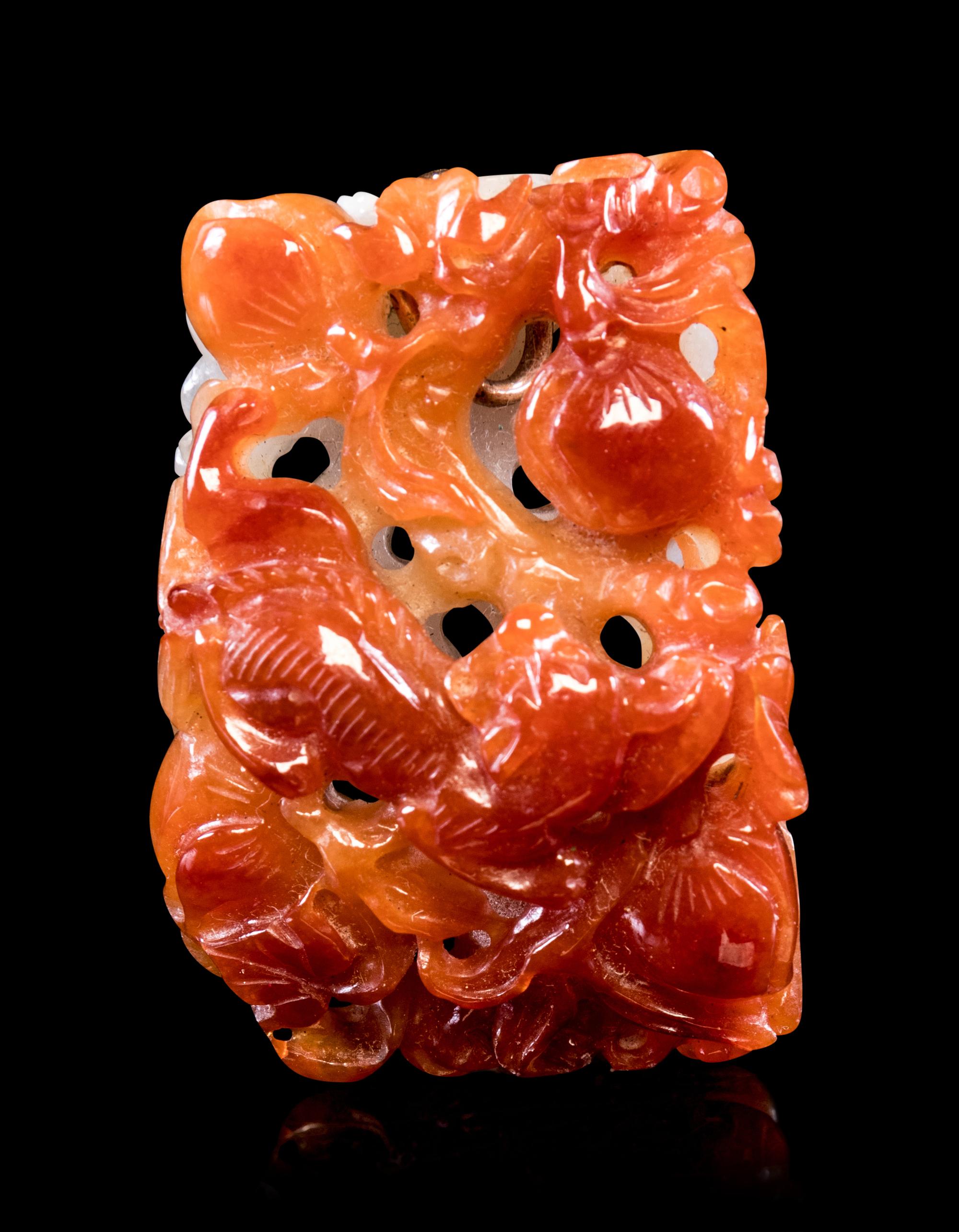 A Russet Jadeite Reticulated Pendant