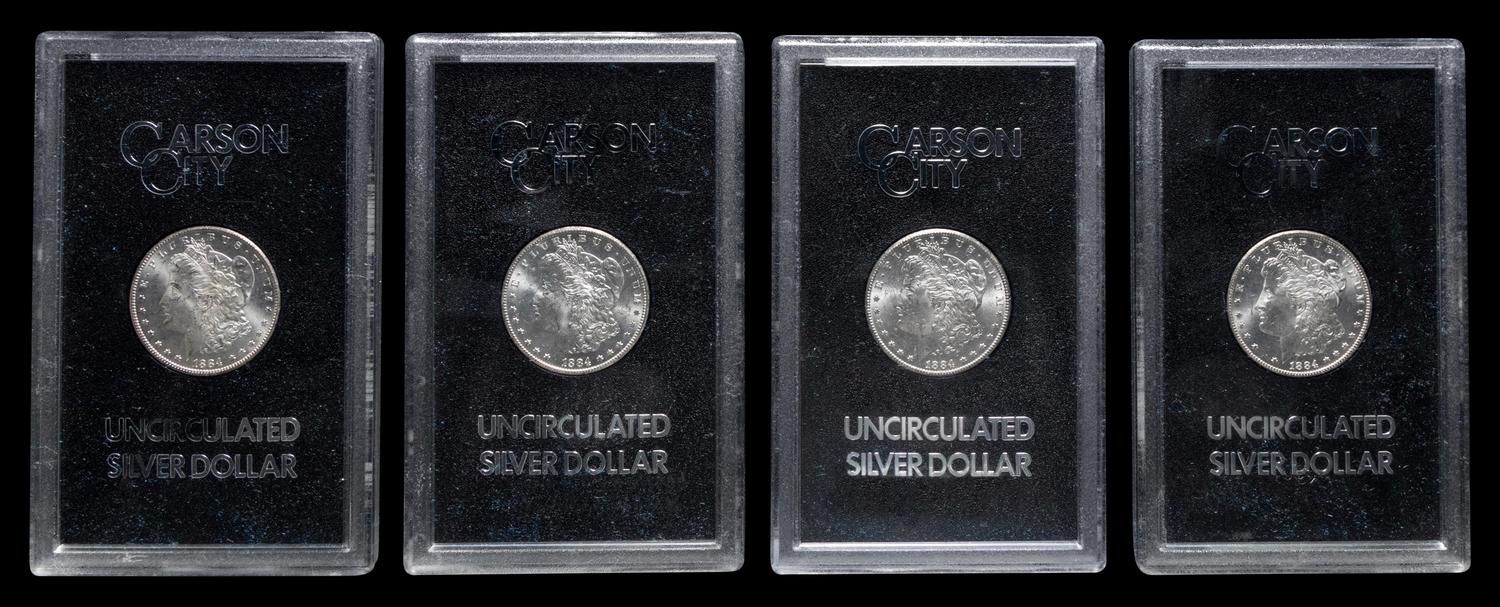 A Group of Ten 1884-CC GSA: Morgan $1 Coins