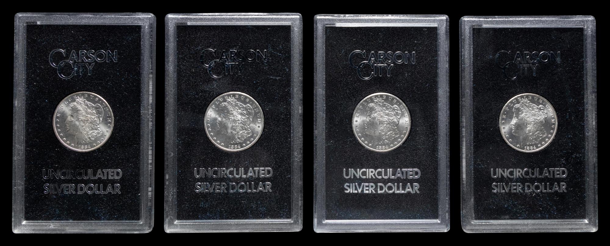 A Group of Ten 1884-CC GSA: Morgan $1 Coins