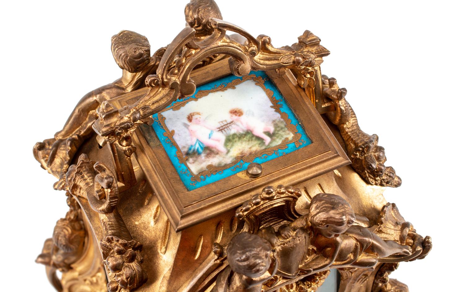 A Gilt Bronze and Sèvres Style Porcelain Carriage Clock