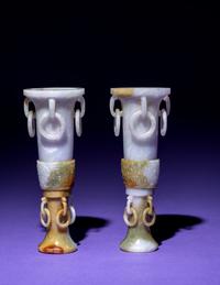 A Pair of Chinese Lavender and Russet Jadeite Gu Vases