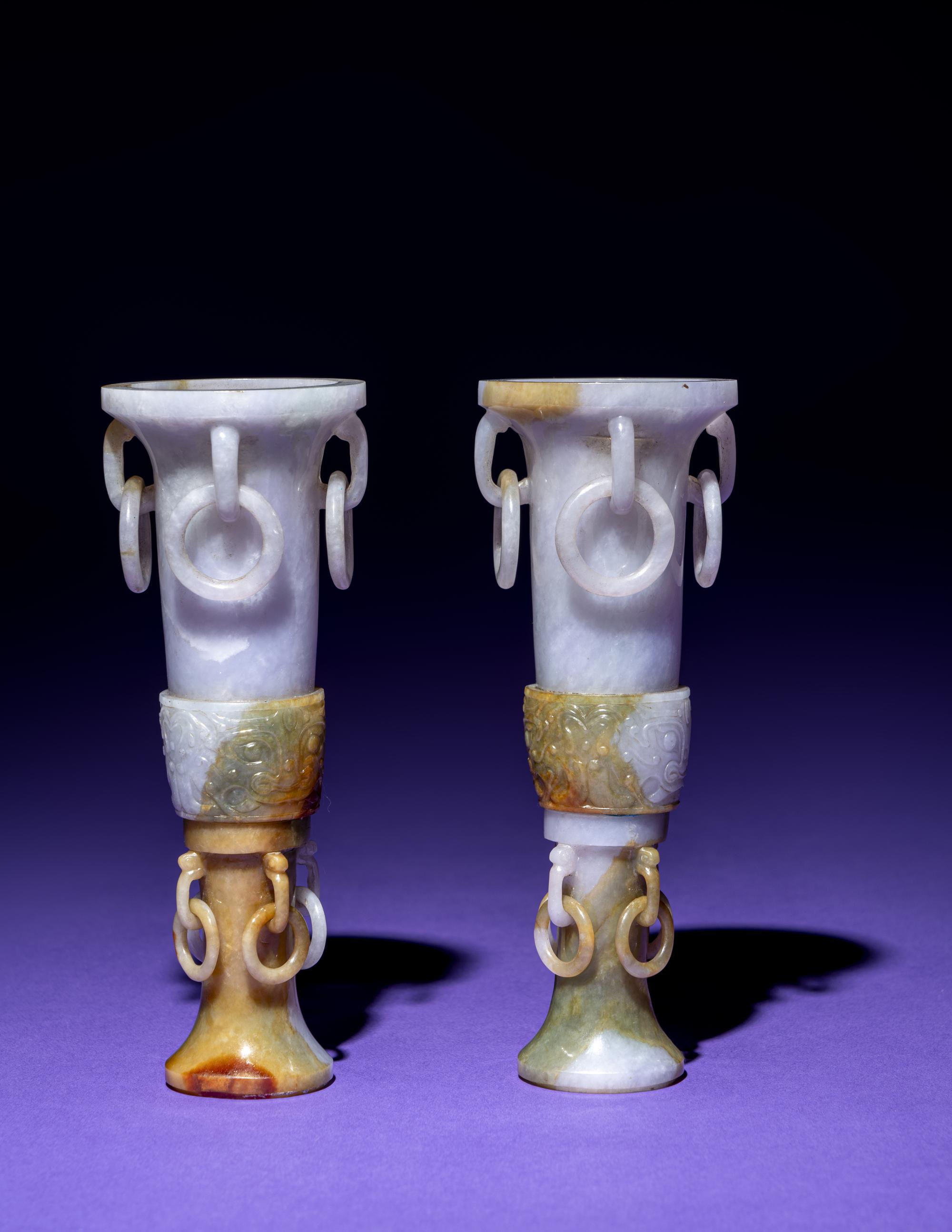 A Pair of Chinese Lavender and Russet Jadeite Gu Vases