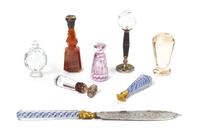 A Collection of Glass and Stone Mounted Seals, Length of longest 7 3/8 inches.