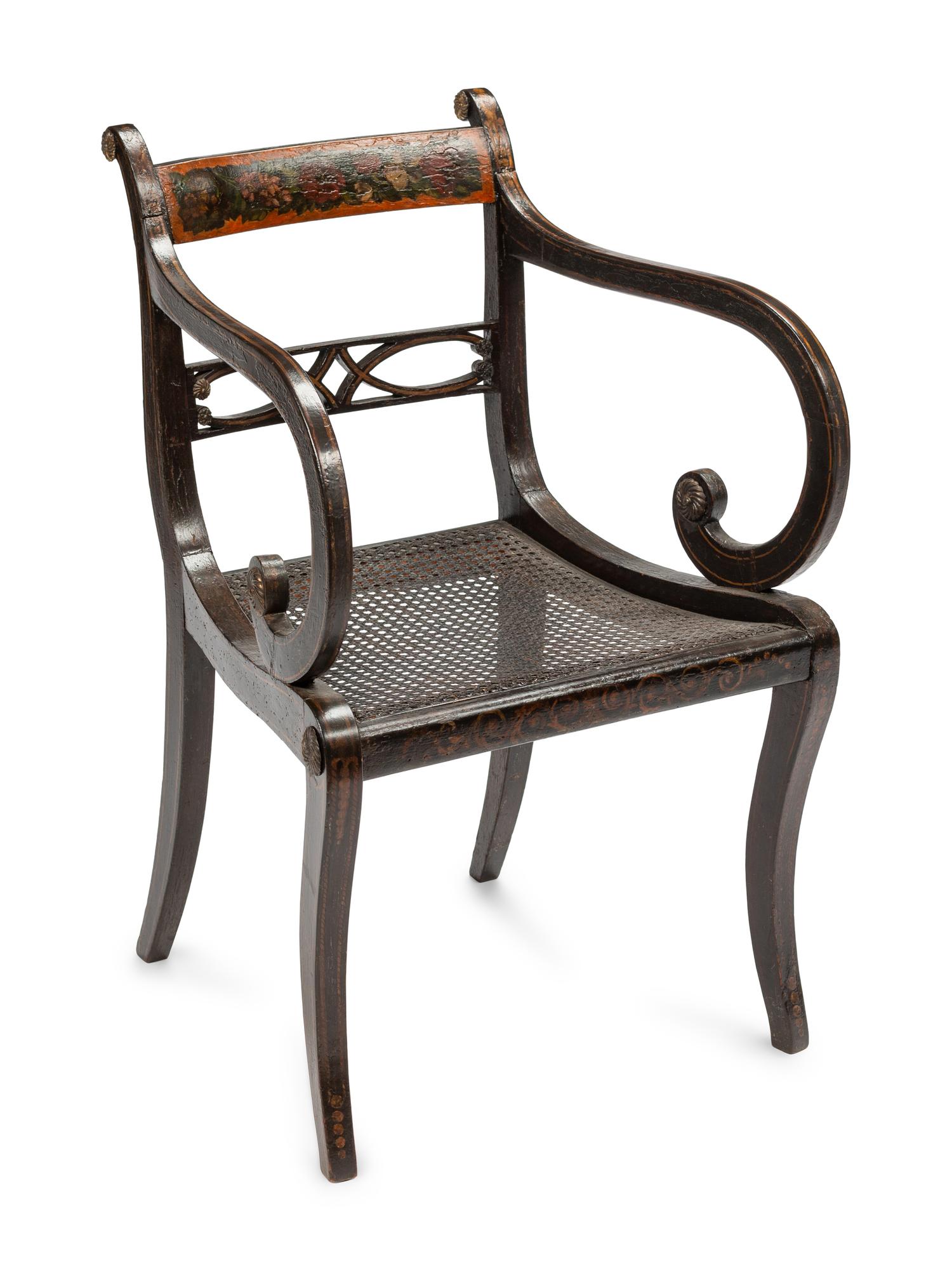 A Set of Six Regency Stencil Decorated and Parcel Gilt Ebonized Dining Chairs