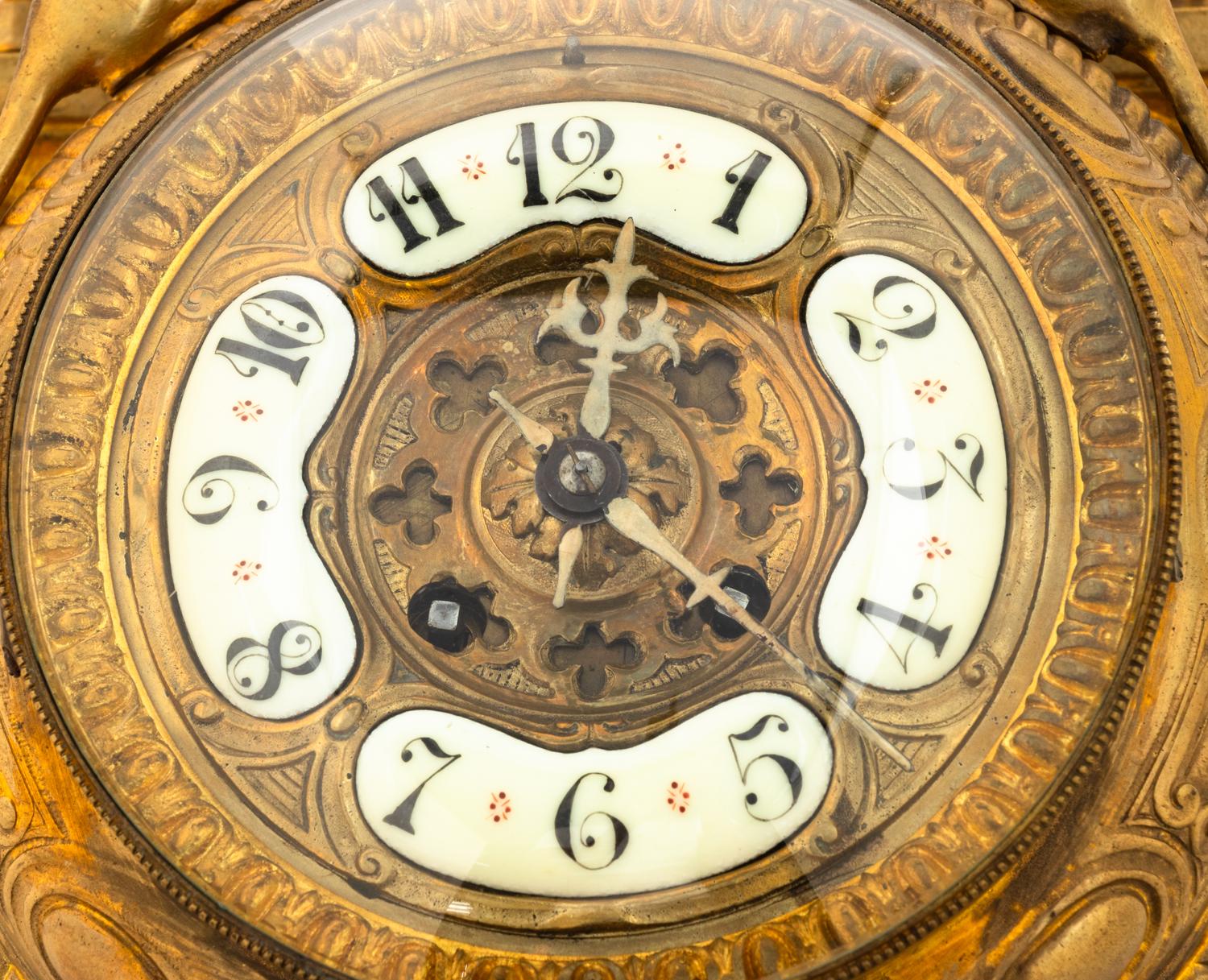 A Louis XV Style Gilt Bronze Cartel Clock