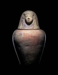An Egyptian Painted Pottery Canopic Jar