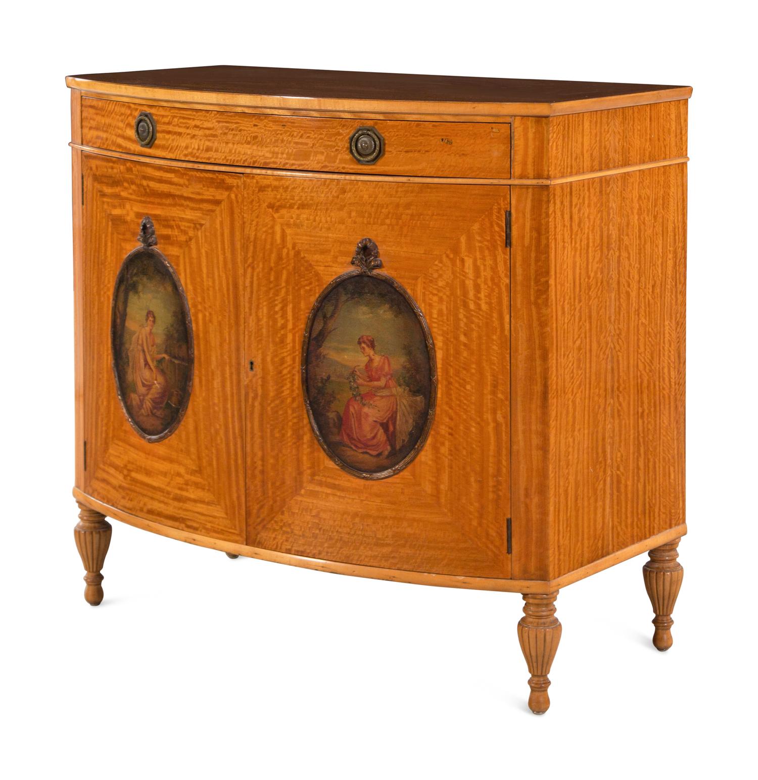 An Edwardian Painted Satinwood Bowfront Cabinet