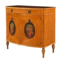 An Edwardian Painted Satinwood Bowfront Cabinet