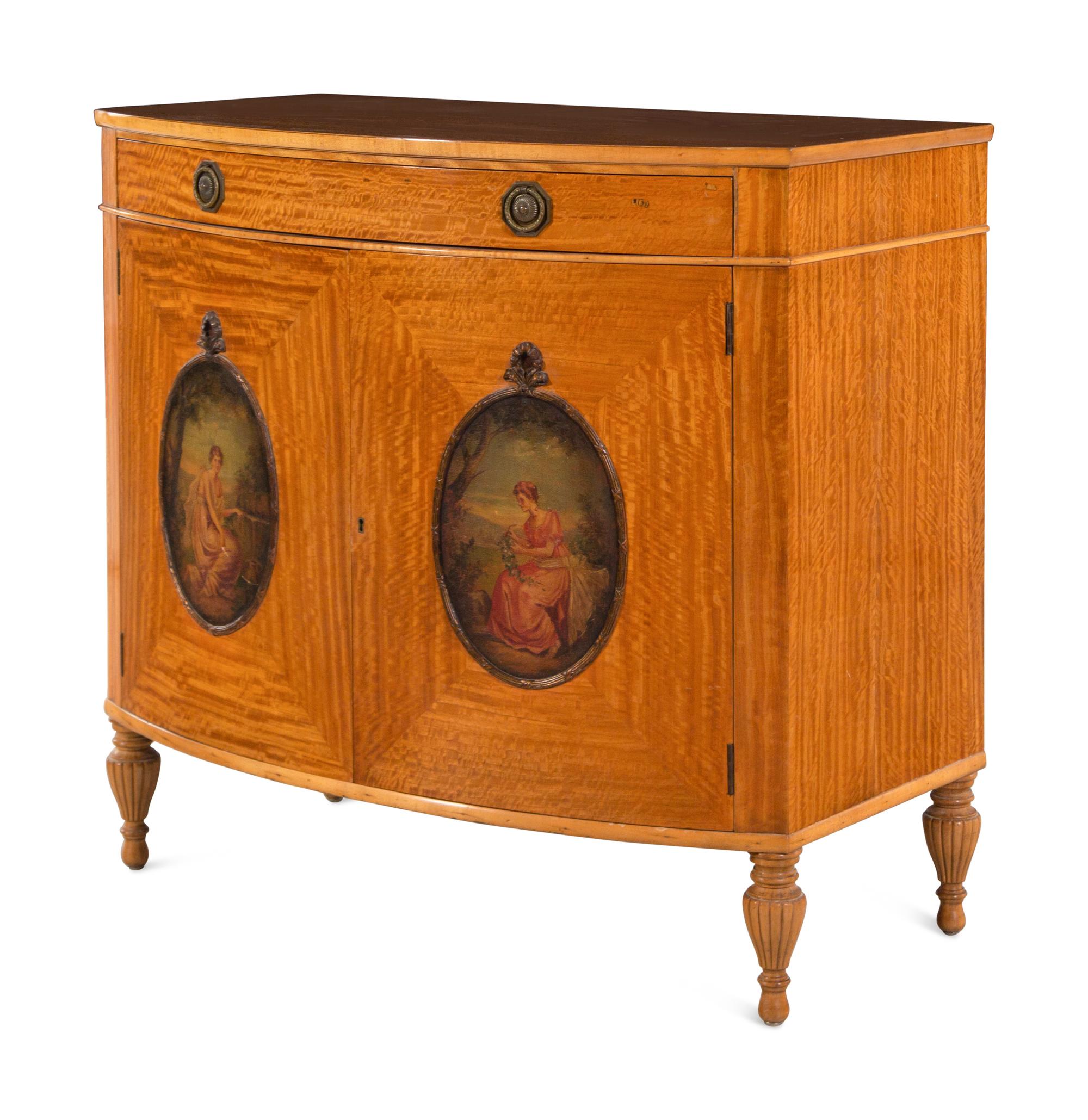 An Edwardian Painted Satinwood Bowfront Cabinet