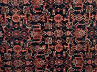 A Persian Senneh Wool Rug