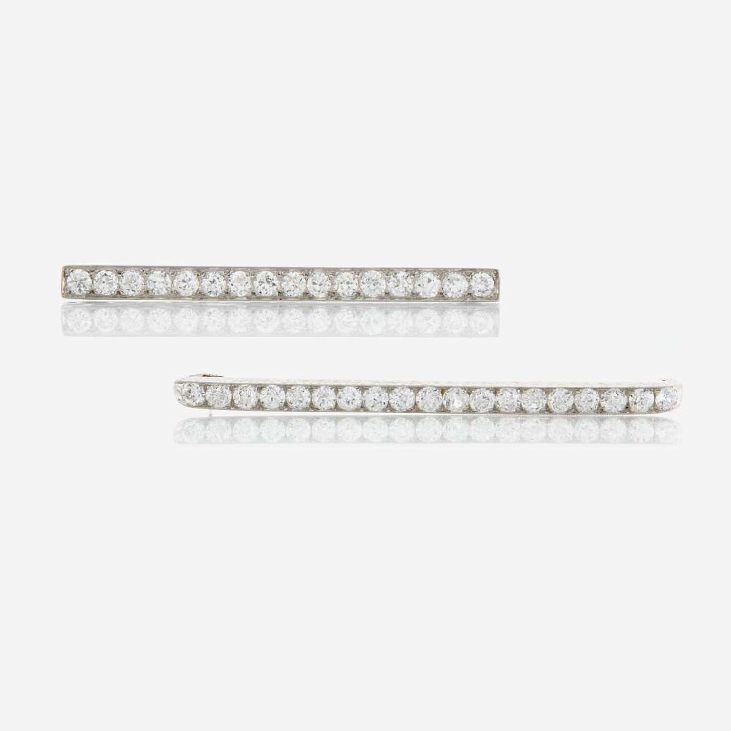 Two diamond and platinum brooches