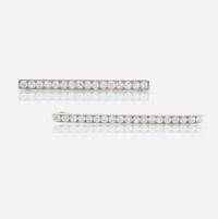 Two diamond and platinum brooches