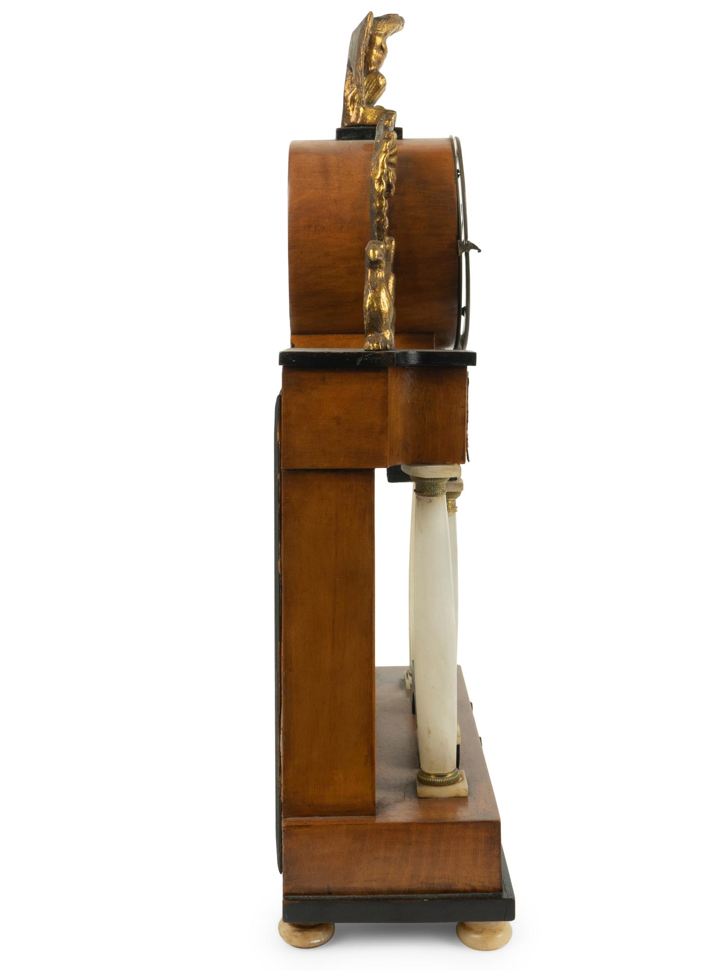 An Austrian French Empire Style Alabaster and Giltwood Portico Clock — EARLY 19TH CENTURY