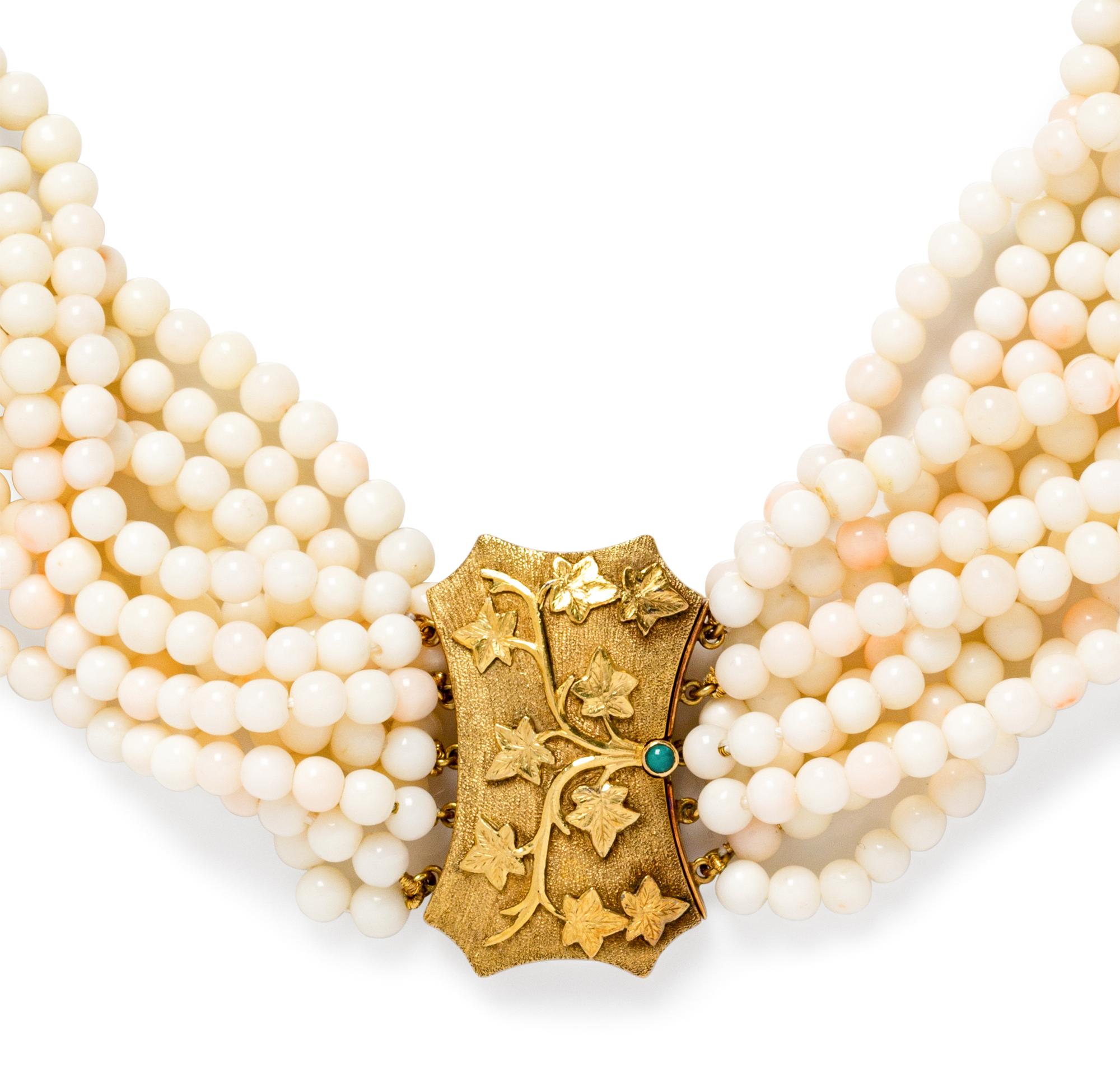 A Yellow Gold and White Coral Torsade Necklace,